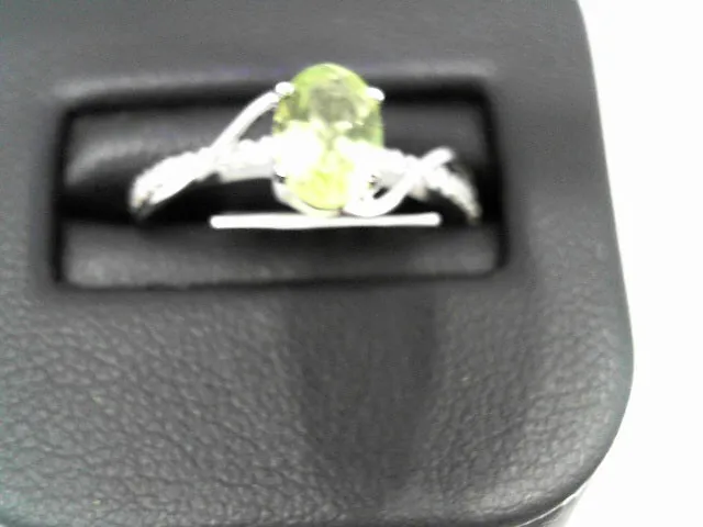 10K WG AND PERIDOT RING W/DIAM