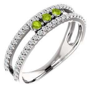 14KT GOLD .15 CTW PERIDOT & .25 CTW DIAMOND ACCENT NEGATIVE SPACE RING