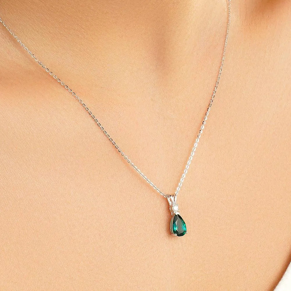 1.7 CT. Pear Shaped Emerald Solitaire Pendant with White Sapphire