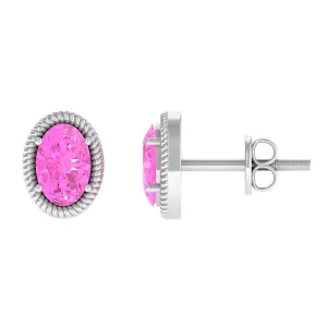 Oval Cut Pink Sapphire Solitaire Stud Earrings in Rope Frame