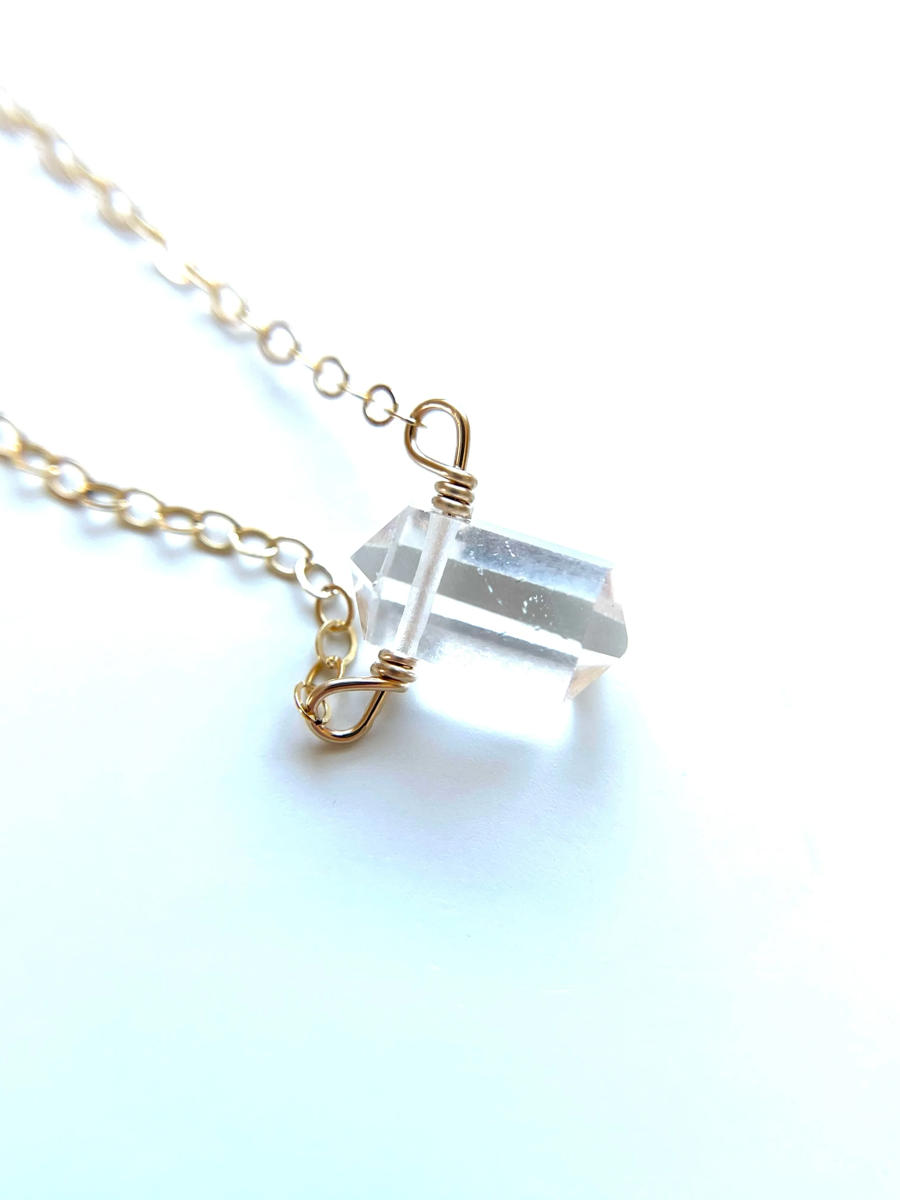 Tiny dainty clear quartz point - layering crystal healing jewelry - April Birthstone